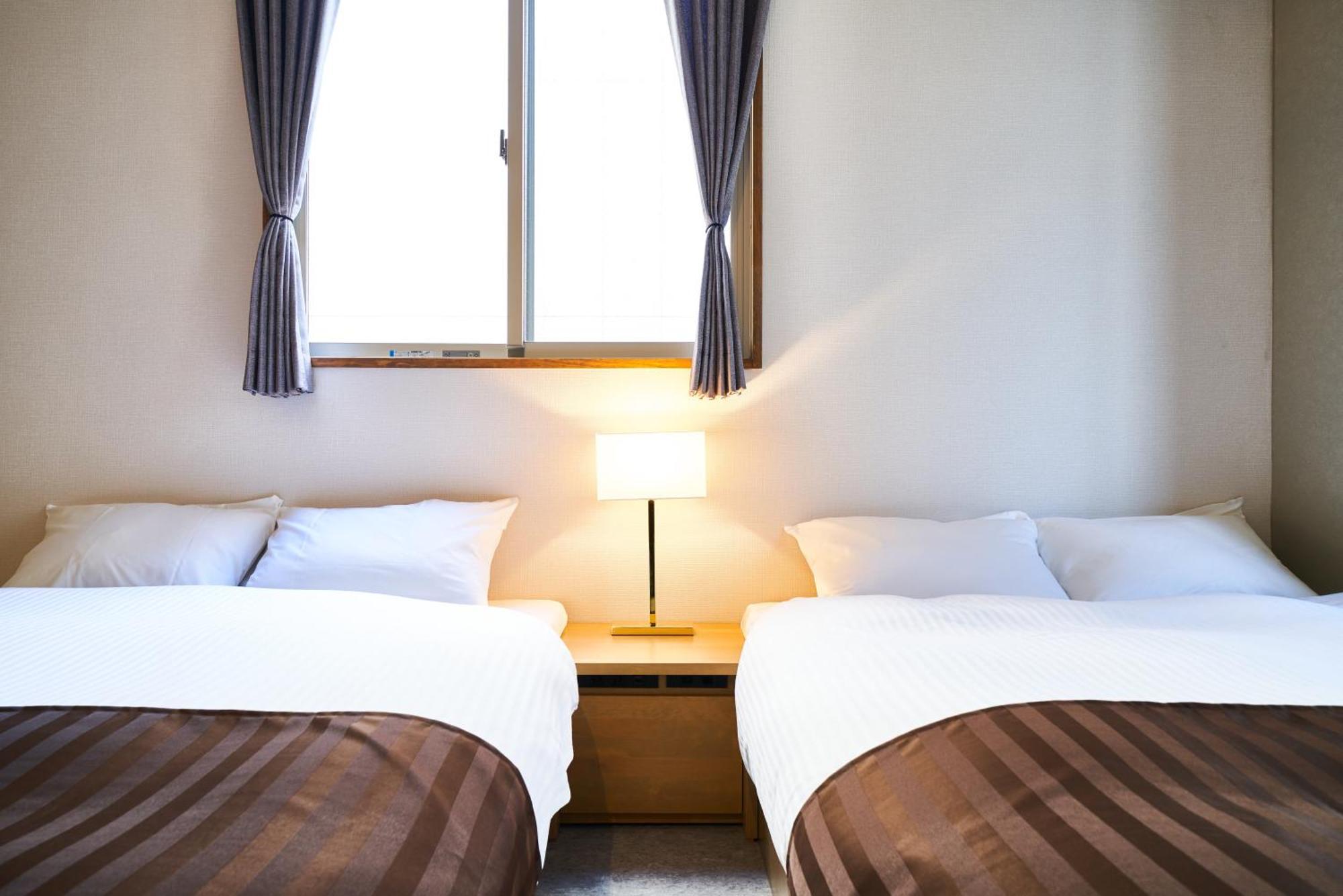 &And Hostel Shinsaibashi East Οσάκα Δωμάτιο φωτογραφία