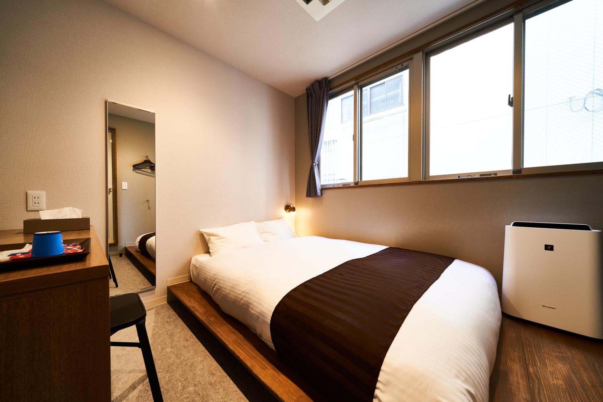 &And Hostel Shinsaibashi East Οσάκα Δωμάτιο φωτογραφία