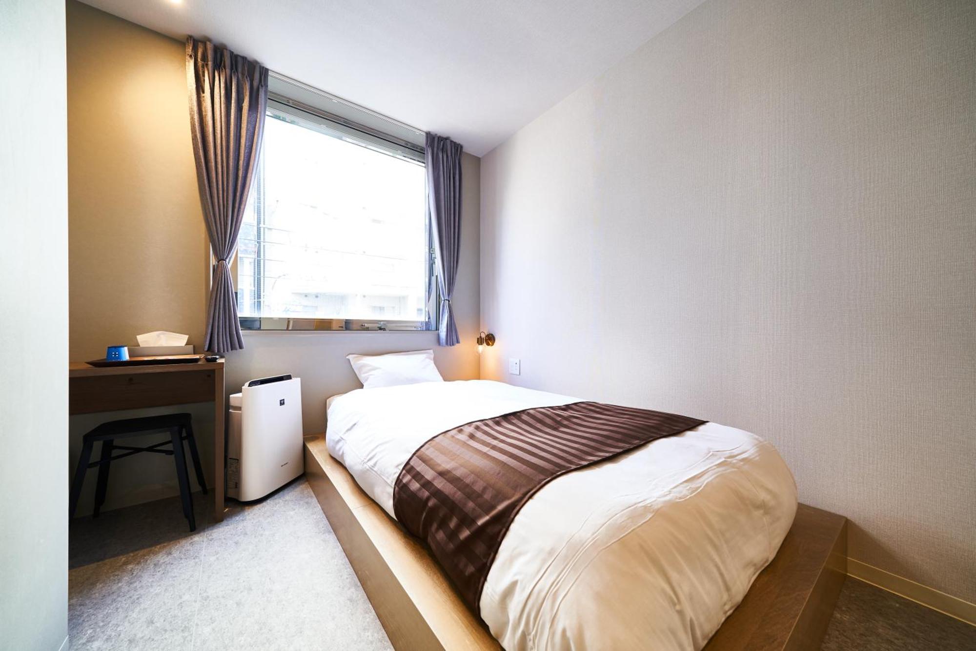 &And Hostel Shinsaibashi East Οσάκα Δωμάτιο φωτογραφία
